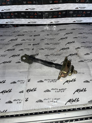 Ограничитель открывания двери, передний 80430AV600 NISSAN