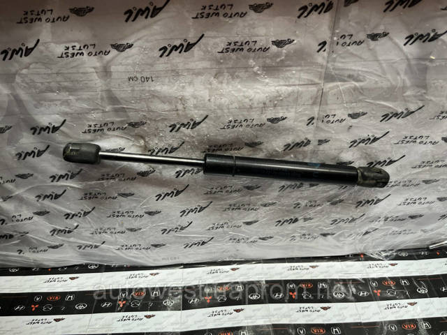 Амортизатор задней двери 84430AV600 NISSAN