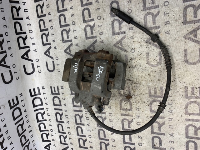 Суппорт тормозной, передний, левый 34116857687 BMW