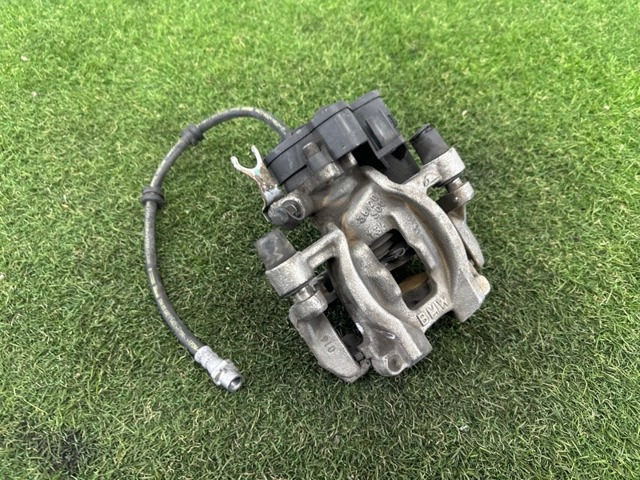 Мотор привода тормозного суппорта заднего 34216860007 BMW