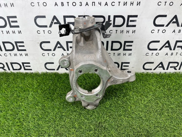 Кулак поворотный передний левый 400156RR0A NISSAN