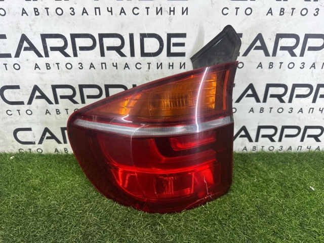Фонарь задний левый, внешний 63217227789 BMW