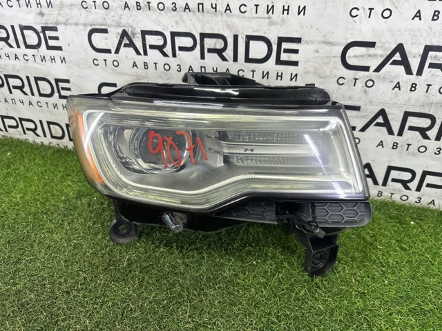 Правая блок фара 68111000AE CHRYSLER