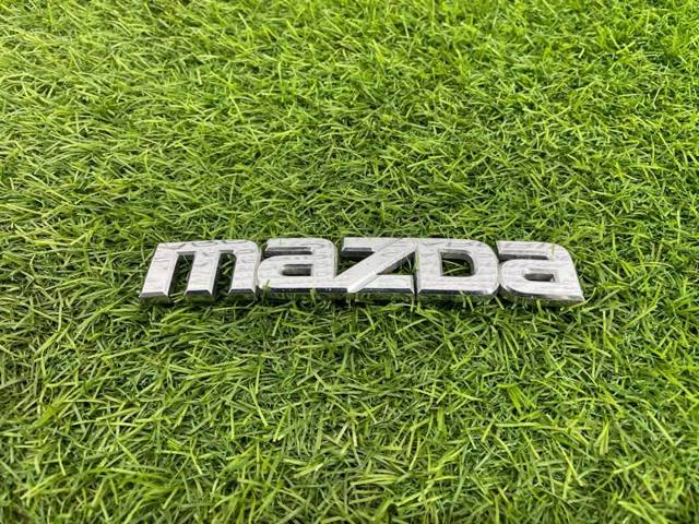 Фирменный значок Mazda 6