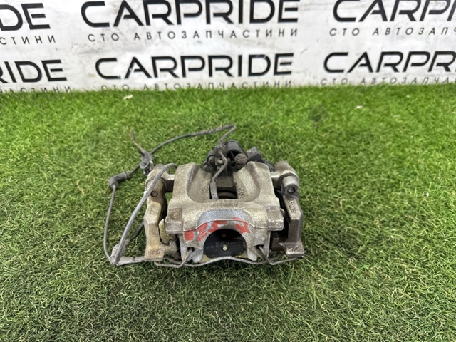 Суппорт тормозной задний правый LR061380 LAND ROVER