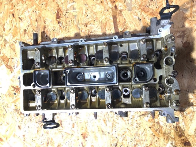 Головка цилиндров RF8E5E6090AA FORD