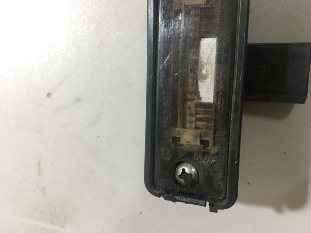 Фонарь освещения номера 1J6943021 VAG