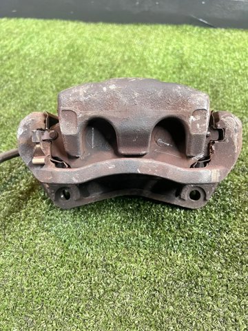 41001CC00A NISSAN Суппорт тормозной передний правый купить в Чернигов