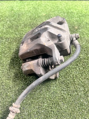 41011CC00A NISSAN Суппорт тормозной передний левый купить в Ровно