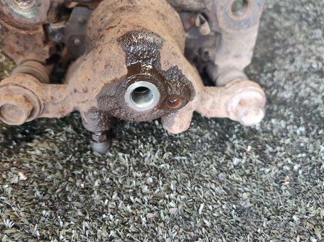 Суппорт тормозной левый задний 44011JG00A NISSAN