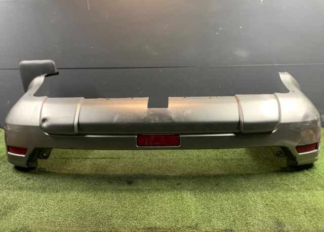 Бампер задний 850228H326 NISSAN