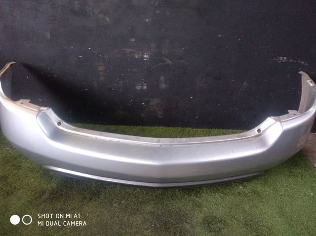 Бампер задний 85022CA026 NISSAN