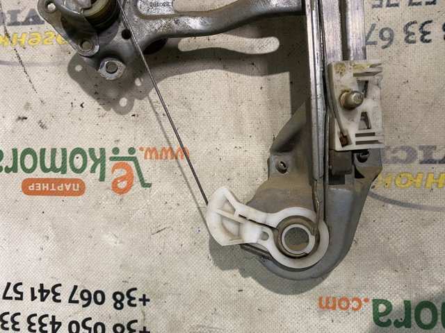 Механизм стеклоподъемника двери задней, левой 90464335 OPEL