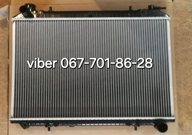 Радиатор системы охлаждения двигателя 214107C002 NISSAN