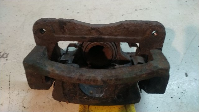 Суппорт тормозной задний правый 582303E600 HYUNDAI