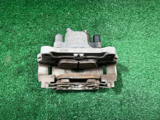 Суппорт тормозной, передний, левый JX6Z2B121N FORD
