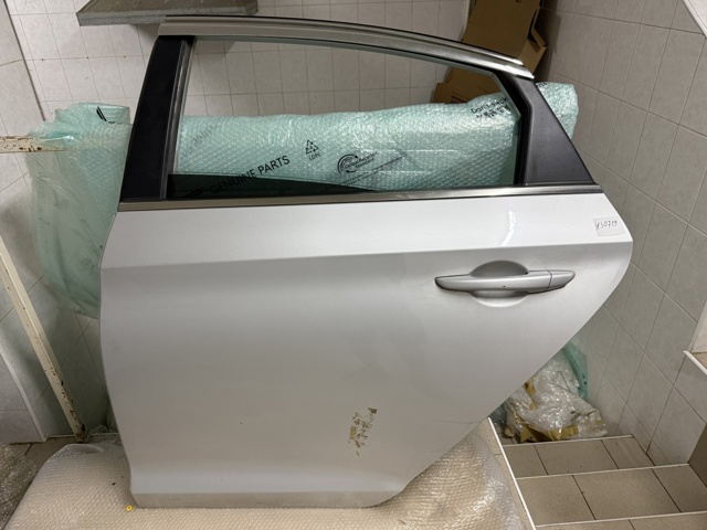 Дверь пассажирская задняя левая 77003C1020 HYUNDAI