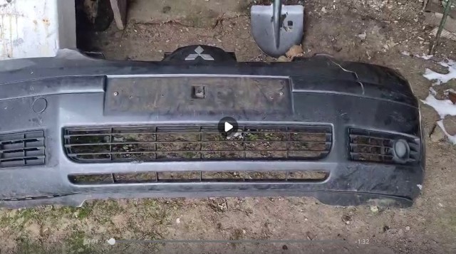 Передний бампер 6400A917 MITSUBISHI