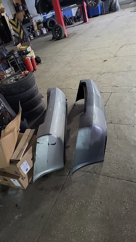 Бампер задний 85022AU340 NISSAN