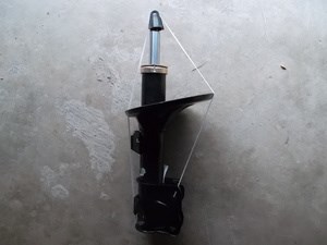 Амортизатор передний левый M112905010 CHERY