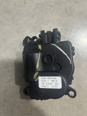 Моторчик заслонки печки DG9H19E616AA FORD