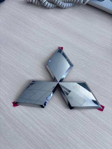 Эмблема решетки радиатора MN167684 MITSUBISHI