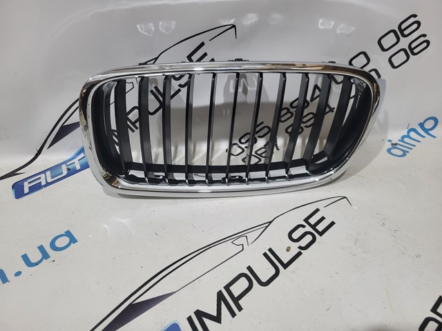 Решетка радиатора левая 51137255411 BMW