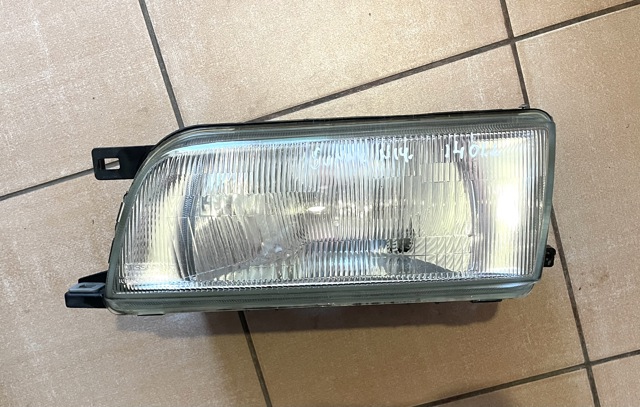 Фара основная левая B606063C00 NISSAN