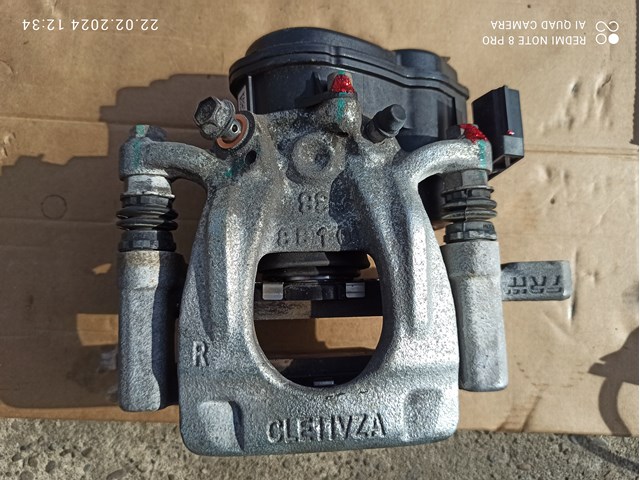 Задний правый суппорт 440014CA0A NISSAN