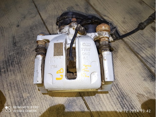 Суппорт тормозной левый задний 95B615423D PORSCHE