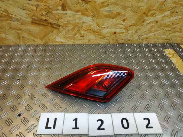 Фонарь задний левый, внутренний 1222569 OPEL