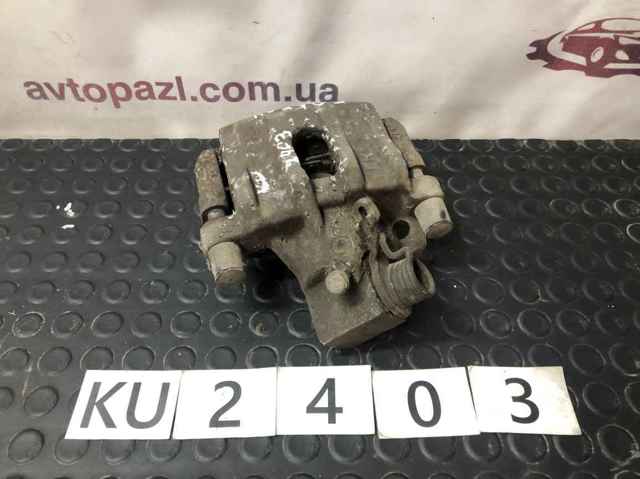 Суппорт тормозной левый задний 2210215 FORD