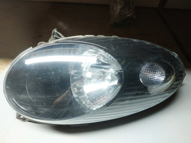 Вставка фары правой 26010AX705 NISSAN