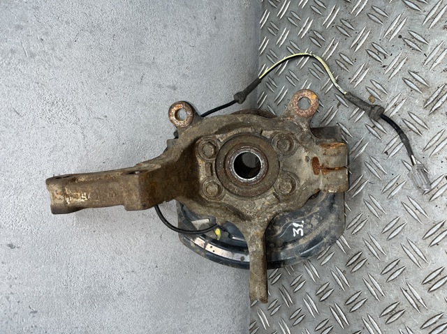 40015JD000 NISSAN Цапфа (поворотный кулак) передний левый купить в Хмельницкий