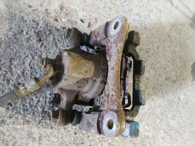 NISSAN 440111BA0A Суппорт задний левый в наличии Одесса