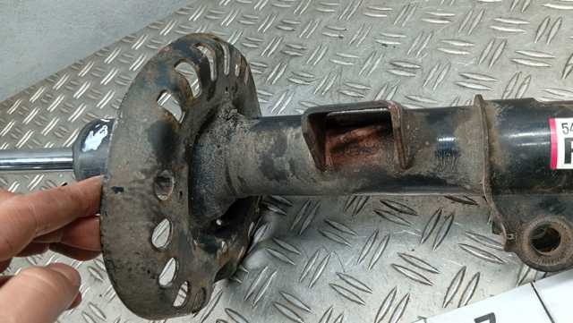 Амортизатор подвески передний левый 546612V250 HYUNDAI