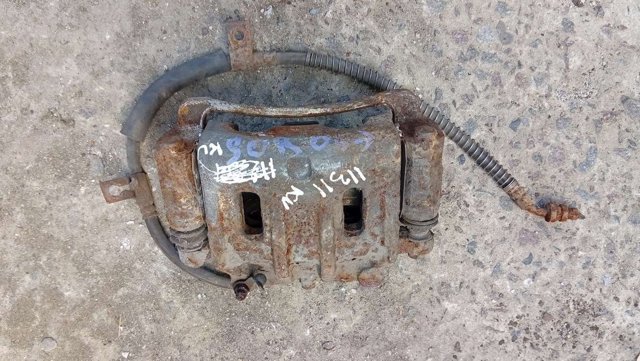 Суппорт тормозной, передний, левый 581103E600 HYUNDAI