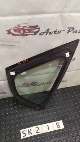 Стукло багажника, правое 65209FG000 SUBARU