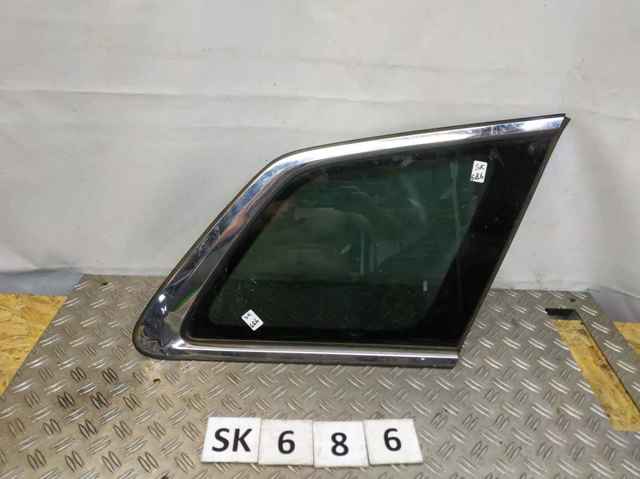 Стекло багажного отсека, правое EG2262950C MAZDA