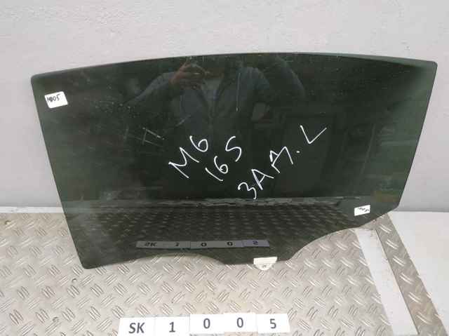 Стекло двери задней левой GHK573510A MAZDA