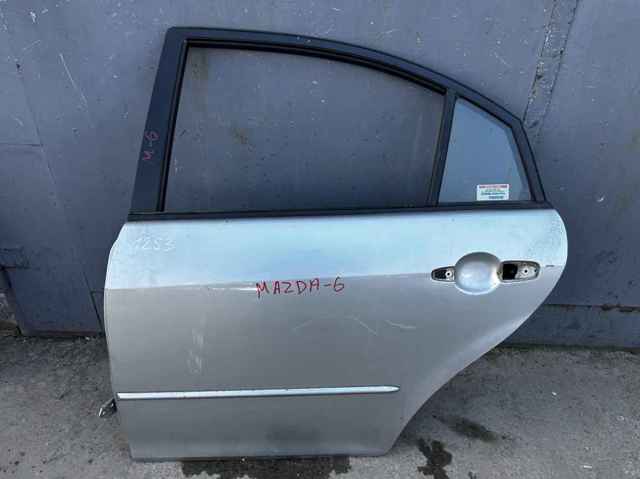 Панель-щека двери задней левой GJ6A73031B MAZDA