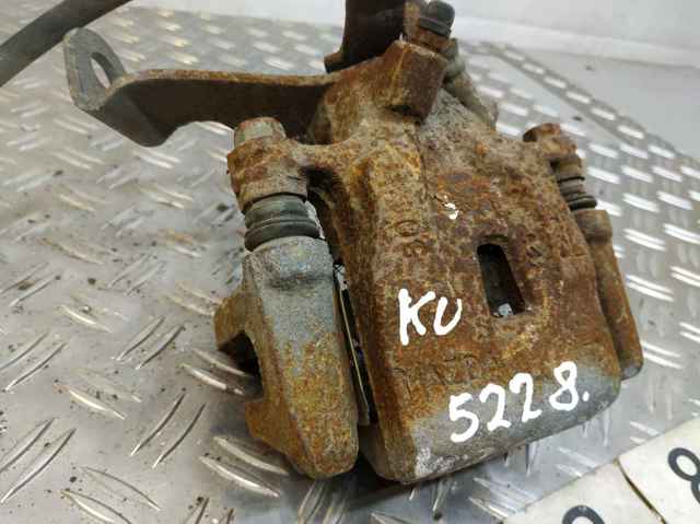 Суппорт тормозной левый задний K0Y12699Z MAZDA