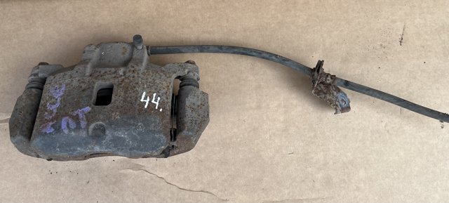 Суппорт тормозной, передний, левый MR955063 MITSUBISHI