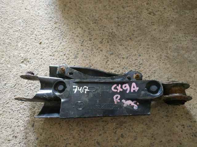 Балансир задний правый TK4928500F MAZDA