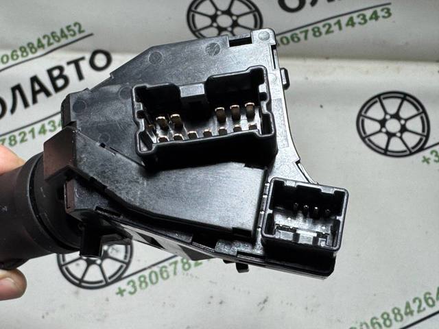 Переключатель подрулевой, левый 25540AV600 NISSAN