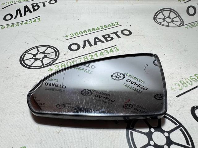 Стекло зеркала заднего вида, левого 96366AU410 NISSAN