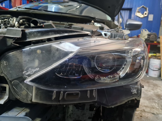 Фара дальнего света в сборе GMG951041E MAZDA