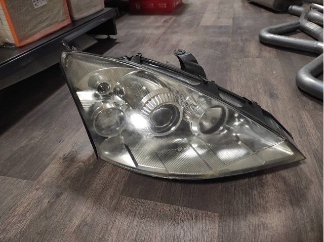 Правая блок фара 1152401 FORD