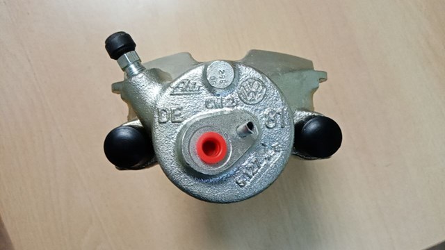 Суппорт тормозной, передний, левый 1K0615123D VAG