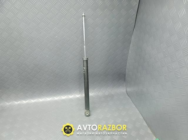 Стойка амортизатора задняя Мазда 2 2